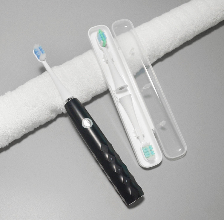 Wholease dura por muito tempo a escova de dentes elétrica do lembrete IPX7 esperto impermeável recarregável com cabeça de 4 escovas