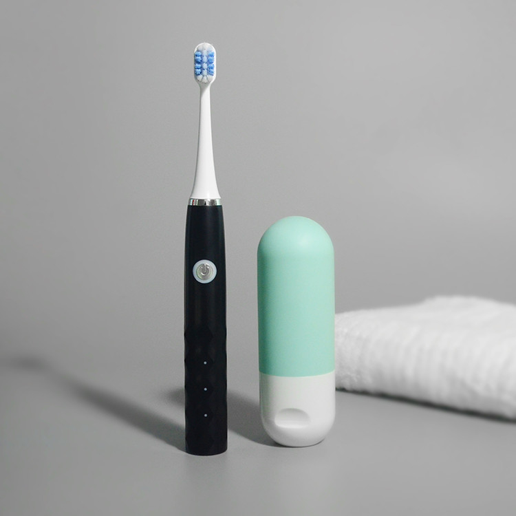 Wholease dura por muito tempo a escova de dentes elétrica do lembrete IPX7 esperto impermeável recarregável com cabeça de 4 escovas